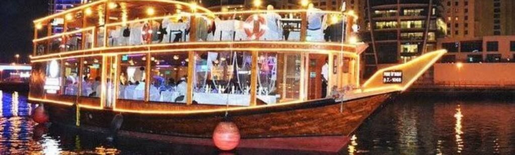 Romantic couple dining on Dhow Cruise.