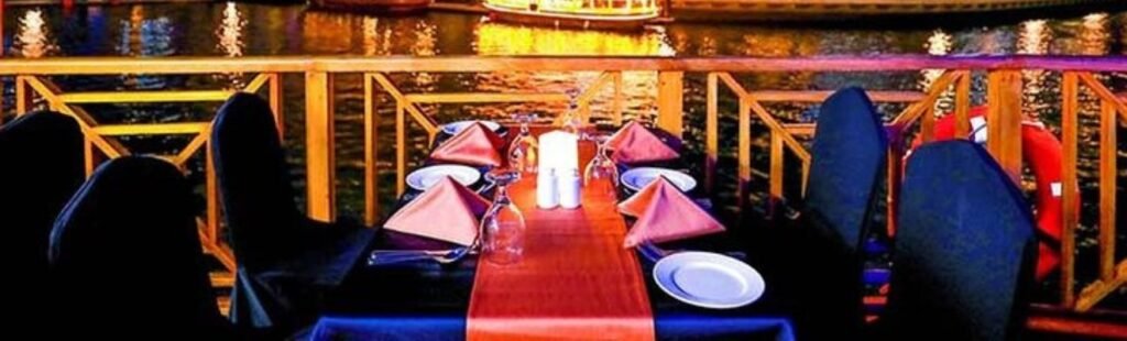 Luxurious interior of a Marina Dhow Dinner Cruise in Dubai.