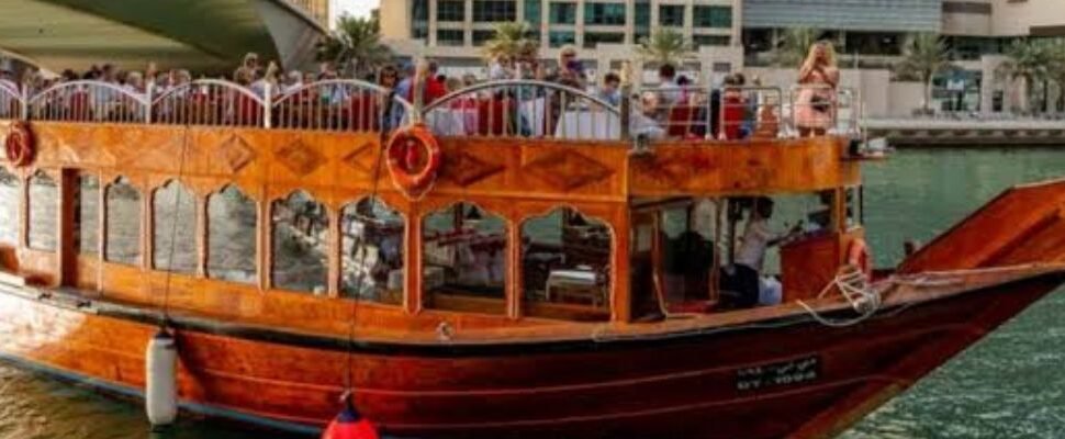 Dhow Cruise Marina sailing on Dubai’s waterfront.