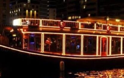 WhatsApp Image 2024-07-11 at 11.17.07 PM (1) › Forever Tourism LLC Marina Dhow Cruise with dinner set against Dubai's skyline.