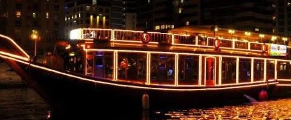 Marina Dhow Cruise with dinner set against Dubai's skyline.