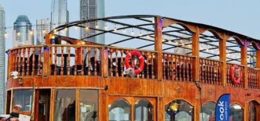 Dhow Cruise Marina with guests dining at sunset.