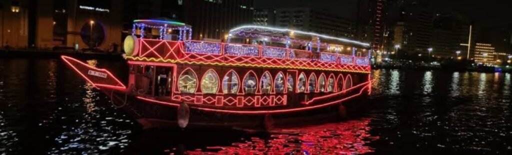 Guests admiring Dubai's skyline from a Dhow Cruise.