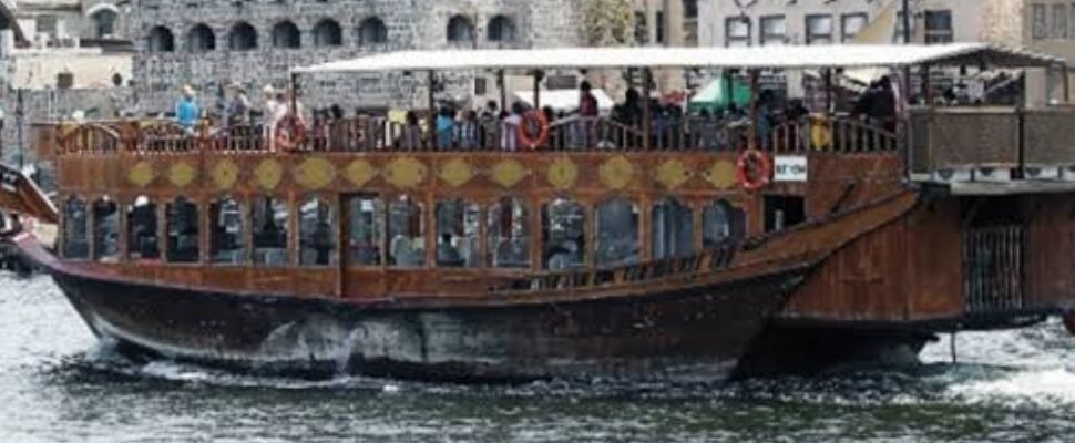 Dhow Cruise with dinner setup in Dubai.