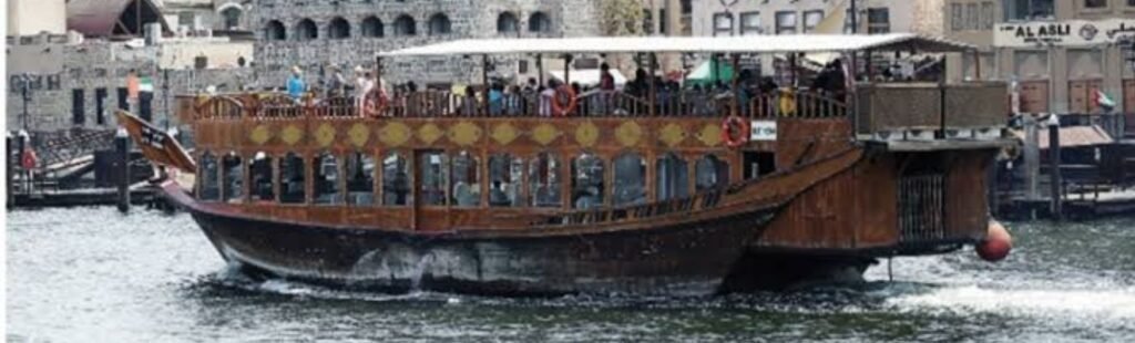 Romantic couple enjoying Dhow Cruise Marina.