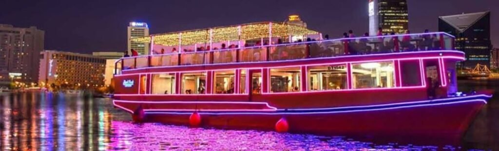 Guests enjoying cultural entertainment on Dhow Cruise Marina.