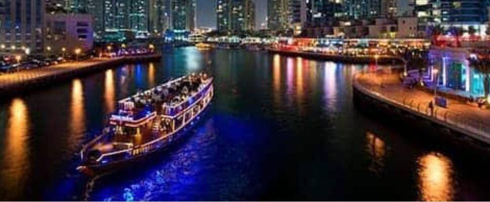 Dhow Cruise Marina sailing in Dubai's marina.