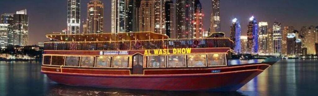 Guests admiring Dubai's skyline from a Dhow Cruise Dinner.