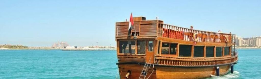 Romantic couple enjoying a Marina Dhow Cruise Dinner in Dubai.