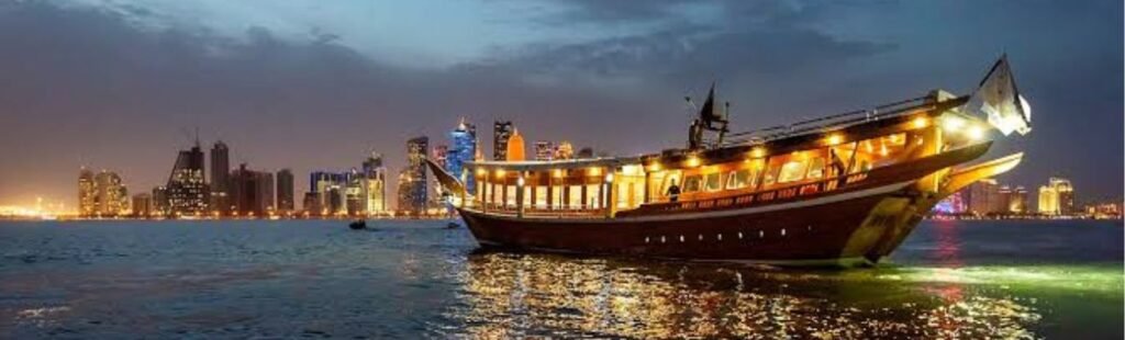 Guests enjoying a sunset cruise on a Dhow boat.