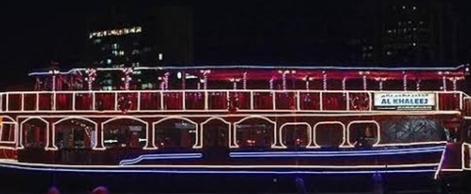 Traditional dhow ship sailing on Dubai's waters.