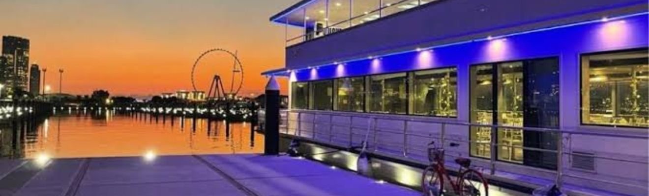 Elegant Dinner Marina Cruise on Dubai’s waterways at sunset.