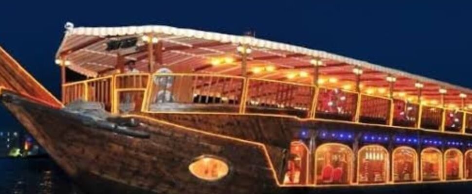 Traditional dhow sailing through the waters of Dubai.