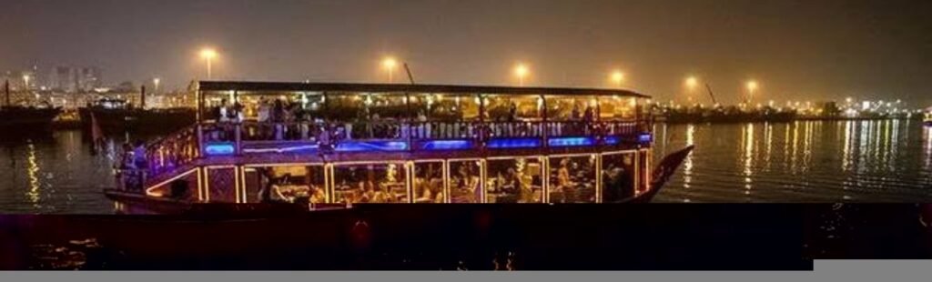 Couples toasting with drinks on the Emirates Dhow Cruise.