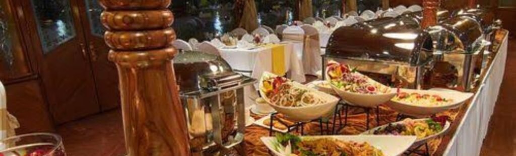 A close-up of elegantly arranged dinner plates on the dhow cruise.