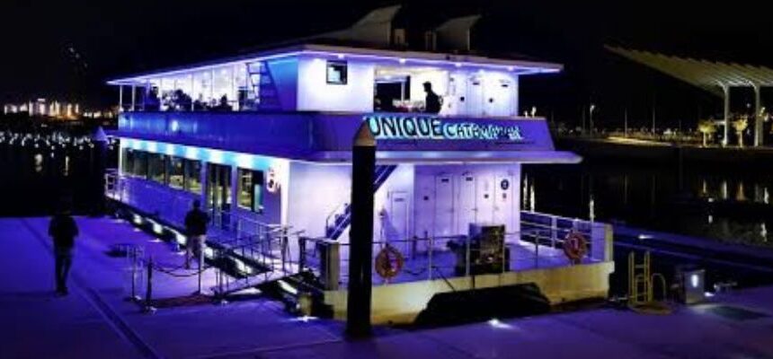 Luxury yacht cruising in Dubai Marina.
