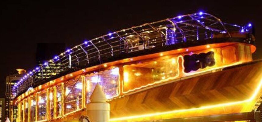 Sunset Dinner Cruise Dubai Marina › Forever Tourism LLC A luxury yacht cruising Dubai Marina at sunset.