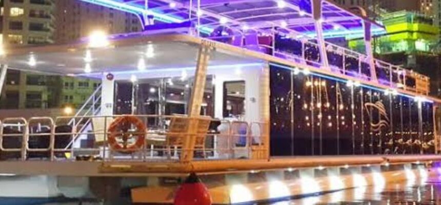 Dubai Luxury Canal Dinner Cruise › Forever Tourism LLC Guests enjoying dinner on the Dubai Luxury Canal Dinner Cruise.