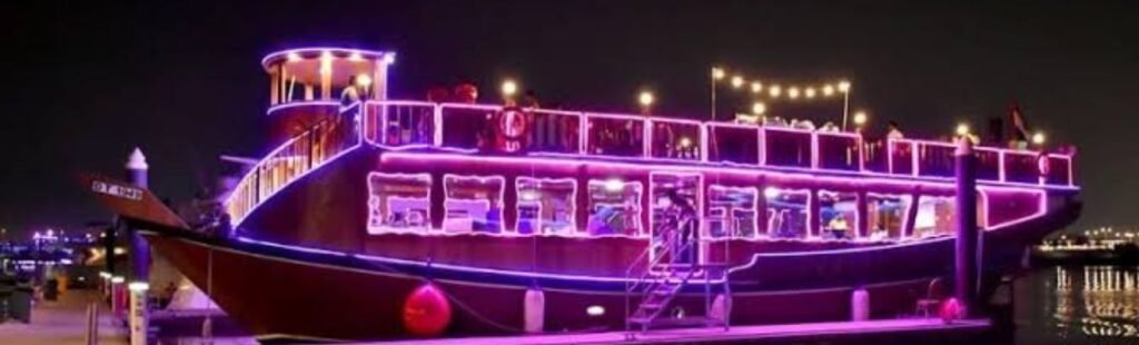 Illuminated Dubai skyline as seen from the Water Canal.