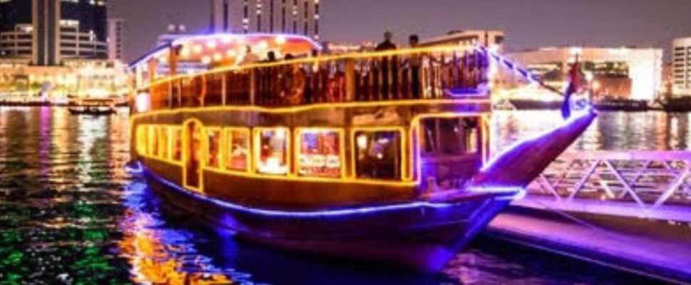 A luxury boat sailing through Dubai's shimmering waters.