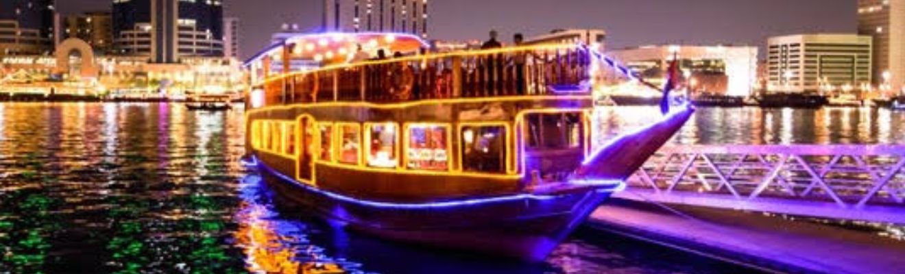 A luxury boat sailing through Dubai's shimmering waters.