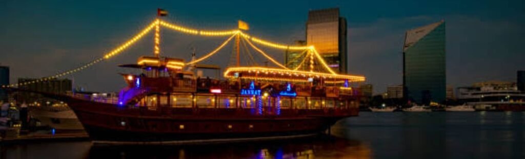 Guests enjoying a gourmet dinner on the Dhow Cruise.