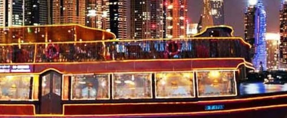 Traditional dhow sailing through Dubai Marina.