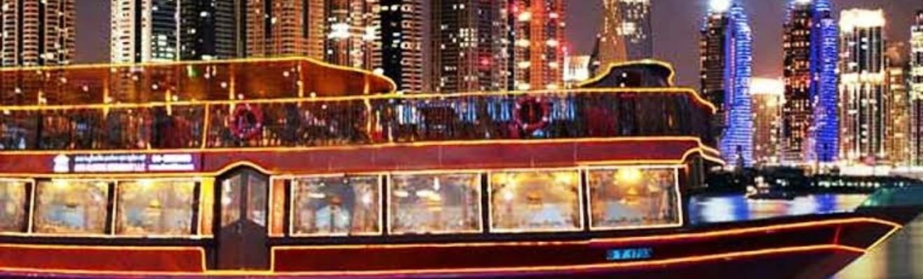 Traditional dhow sailing through Dubai Marina.