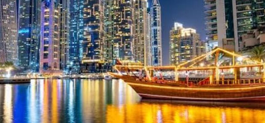 Cruise Booking Dubai › Forever Tourism LLC Scenic view of Dubai Marina with luxury cruise boats.