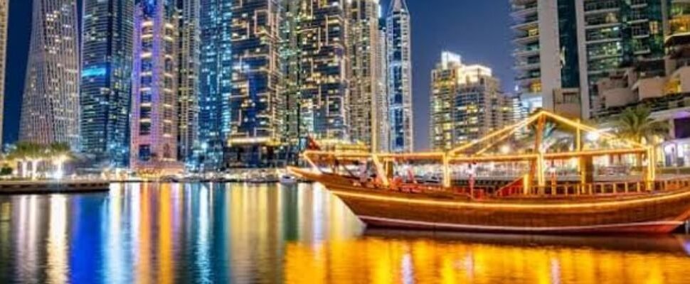 Scenic view of Dubai Marina with luxury cruise boats.