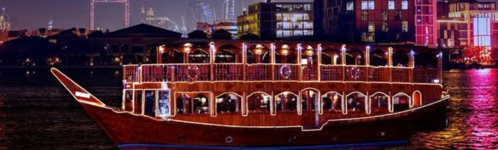 Couple enjoying a romantic dinner on the dhow cruise.