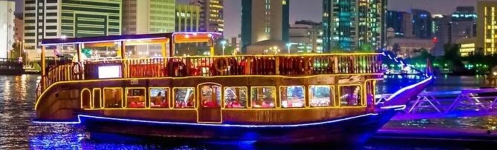 Guests enjoying the view from the deck of the dhow cruise.