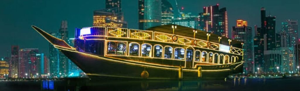 Guests taking photos of the Dubai Creek skyline from the dhow.