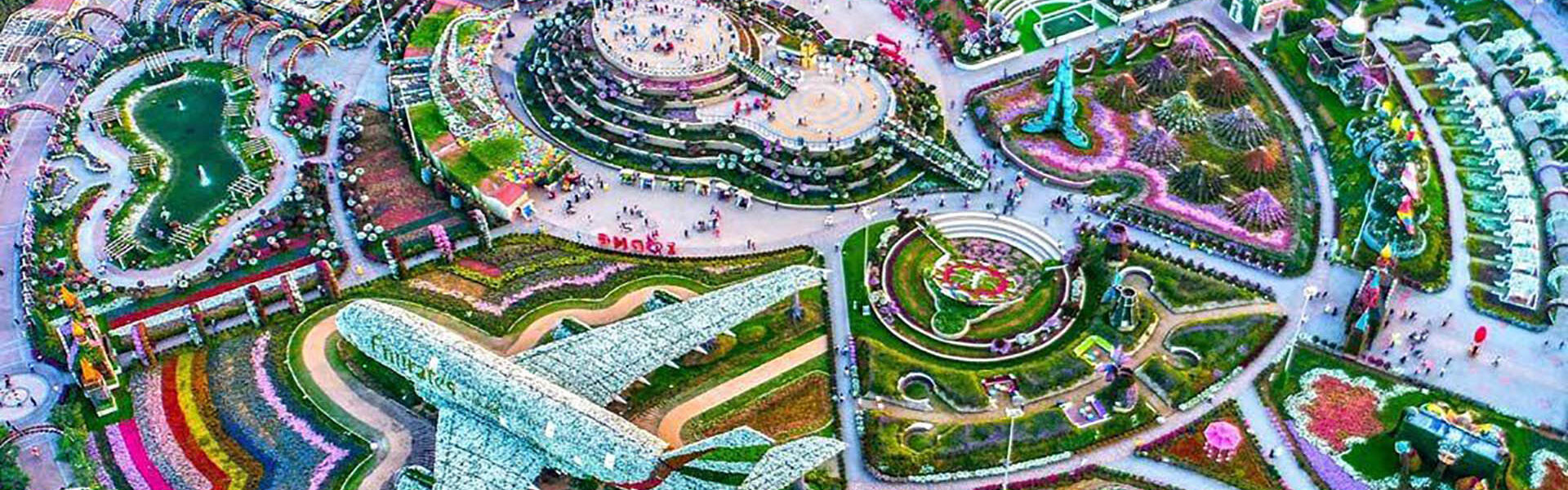 Dubai Miracle Garden: A Floral Wonderland You Must See! › Forever Tourism LLC Stunning floral displays at Dubai Miracle Garden, featuring vibrant flowers, unique designs, and breathtaking landscapes.