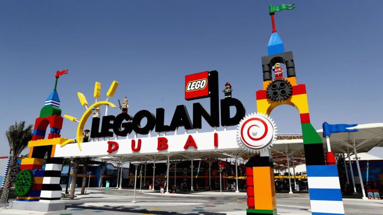 Families enjoying rides at LEGOLAND Water Park with information on LEGOLAND Dubai tickets, timings, and opening hours.
