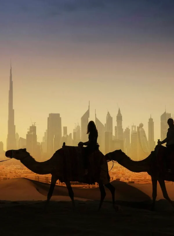 A thrilling evening desert safari in Dubai featuring dune bashing, camel rides, and a luxury Bedouin-style camp under the stars.