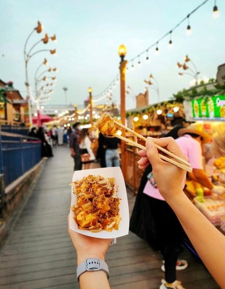 Vibrant night view of Global Village Dubai, featuring stunning pavilions and live entertainment. Check Global Village timing and book Global Village tickets for an exciting cultural experience.