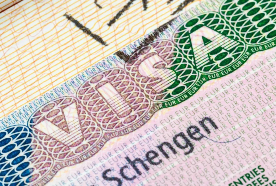 Schengen Visa document with approval stamp, allowing travel to Schengen Visa countries. Learn how to apply from Schengen Visa Dubai and get approved easily.