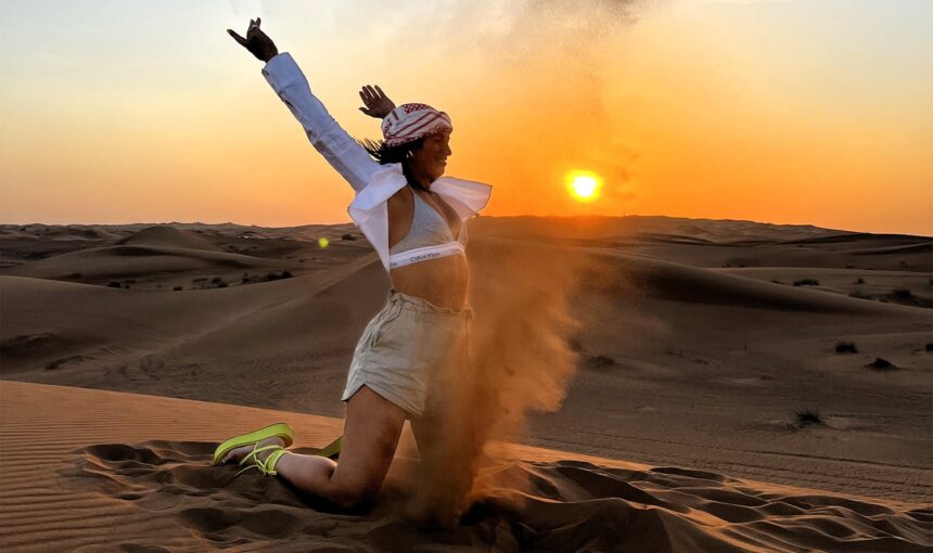Adventurers enjoying an early morning desert safari Dubai, experiencing dune bashing and camel rides. Book your Dubai morning desert safari today for an unforgettable Morning Desert Safari in Dubai adventure.