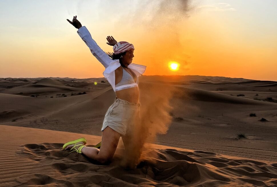 Adventurers enjoying an early morning desert safari Dubai, experiencing dune bashing and camel rides. Book your Dubai morning desert safari today for an unforgettable Morning Desert Safari in Dubai adventure.