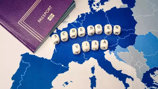 Schengen Visa document with approval stamp, allowing travel to Schengen Visa countries. Learn how to apply from Schengen Visa Dubai and get approved easily.