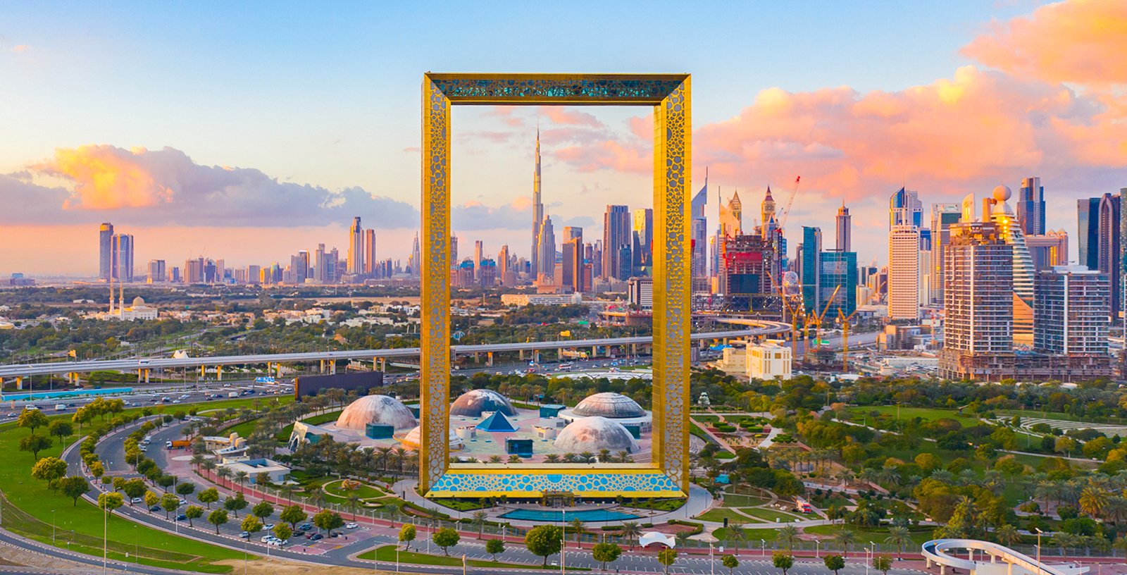 Dubai Frame standing tall at sunset – Get your Dubai Frame Tickets now to enjoy stunning city views. Check Dubai Frame ticket price and Dubai Frame timings for your visit.