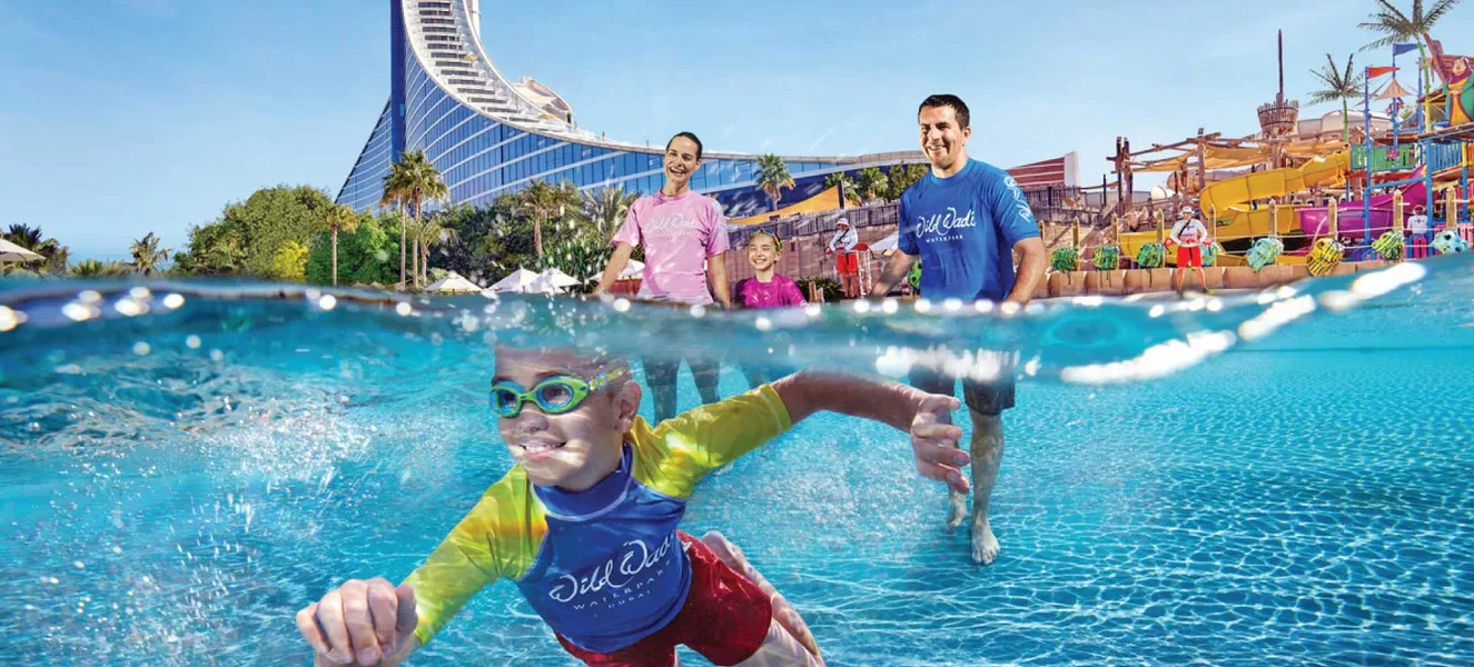 Long Lines? 4 Wild Wadi Waterpark Jumeirah Tips For Splash #Fun › Forever Tourism LLC Aerial view of Wild Wadi Waterpark Jumeirah, a popular water park in Dubai with exciting water slides and pools.