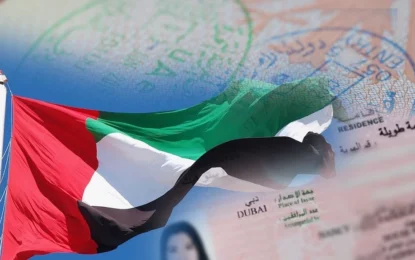 A happy family holding passports and documents, preparing for their Family visa in UAE with the Dubai skyline in the background.