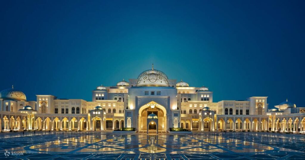 Tourists exploring Ferrari World Yas Island and the peaceful BAPS Hindu Mandir during an exciting Abu Dhabi City Tour.