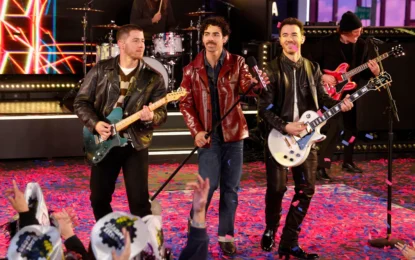 Jonas Brothers performing live on stage during their Living the Dream and 20th Anniversary Jonas Brothers Tour, thrilling fans with an epic celebration.