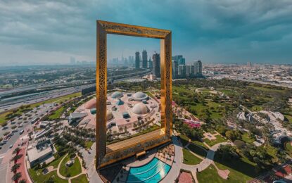 Dubai Frame 2025 Views Will Blow Your Mind! › Forever Tourism LLC Stunning view of Dubai Frame at sunset, highlighting Dubai Frame opening hours, ticket price details, and where to get Dubai Frame tickets.
