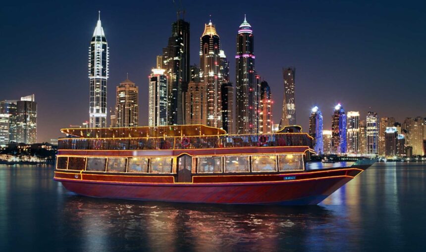 Luxury Dhow Cruise in Dubai Marina offering scenic views, fine dining, and entertainment on a traditional wooden boat.