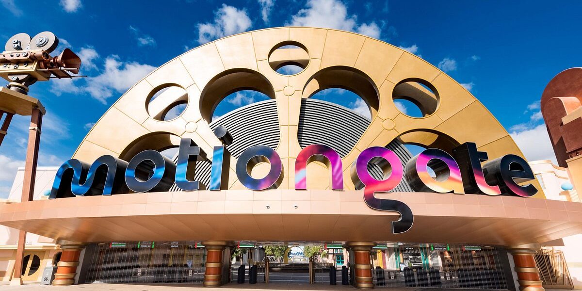 Families enjoying movie-themed rides and attractions at Motiongate Dubai after booking Motiongate Dubai tickets online.