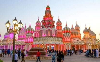Global Village Dubai 2025 – Must-Visit in March! › Forever Tourism LLC Crowds enjoying live Global Village shows at night in Dubai with bright lights and cultural displays, showcasing Global Village Ticket experience.